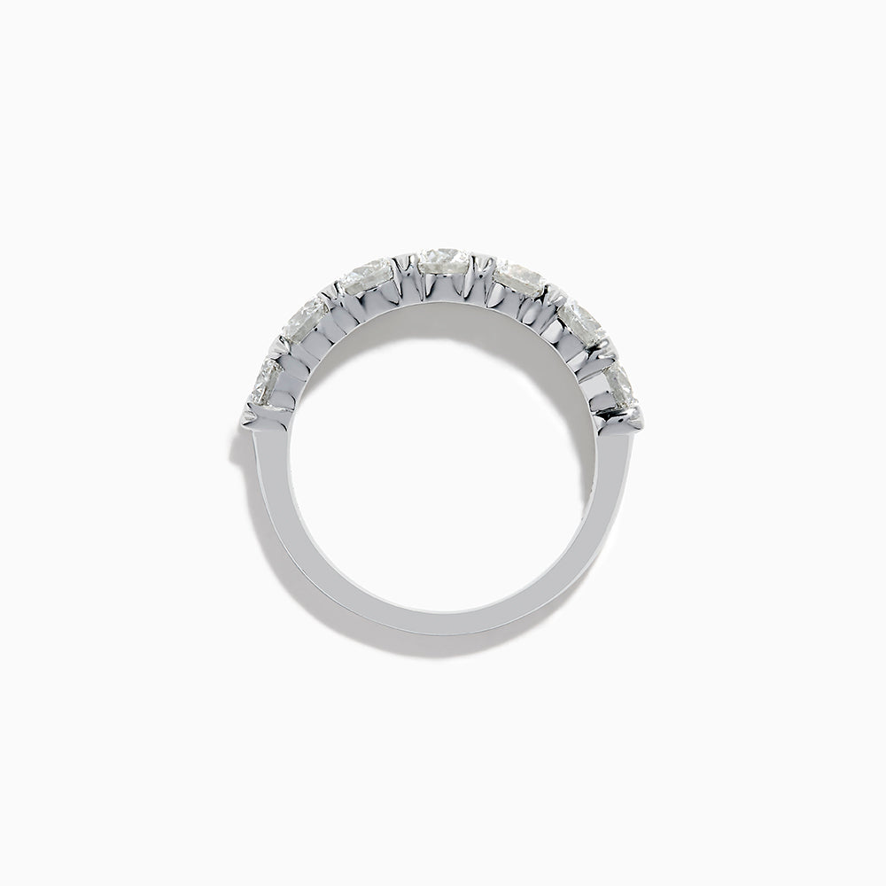 The Lab Grown Diamond Wedding Band in 14K White Gold showcases round, sparkling lab diamonds in a shared-prong setting on a sleek band, set against a white background.