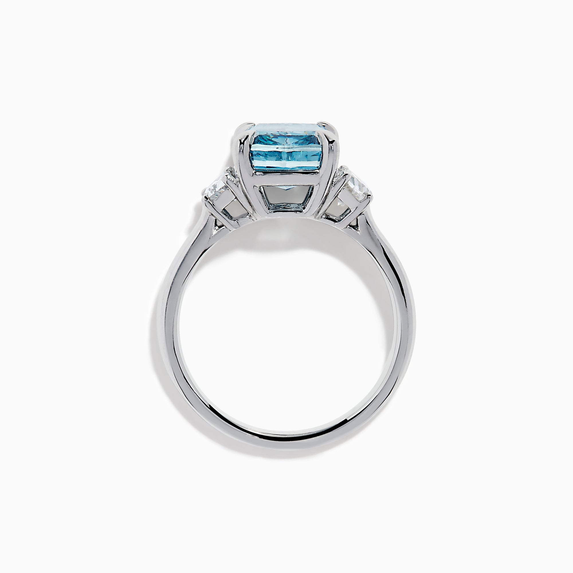 Lab Grown Blue and White Diamond 3-Stone Ring in 14K White Gold, featuring a prominent cushion-cut blue and white diamond center with two clear triangular side stones, shown on a white background.