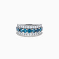 The Lab Grown Blue and White Diamond Wide Band Ring in 14K White Gold showcases a central row of blue stones flanked by lab grown diamonds in a striking triple-band design.