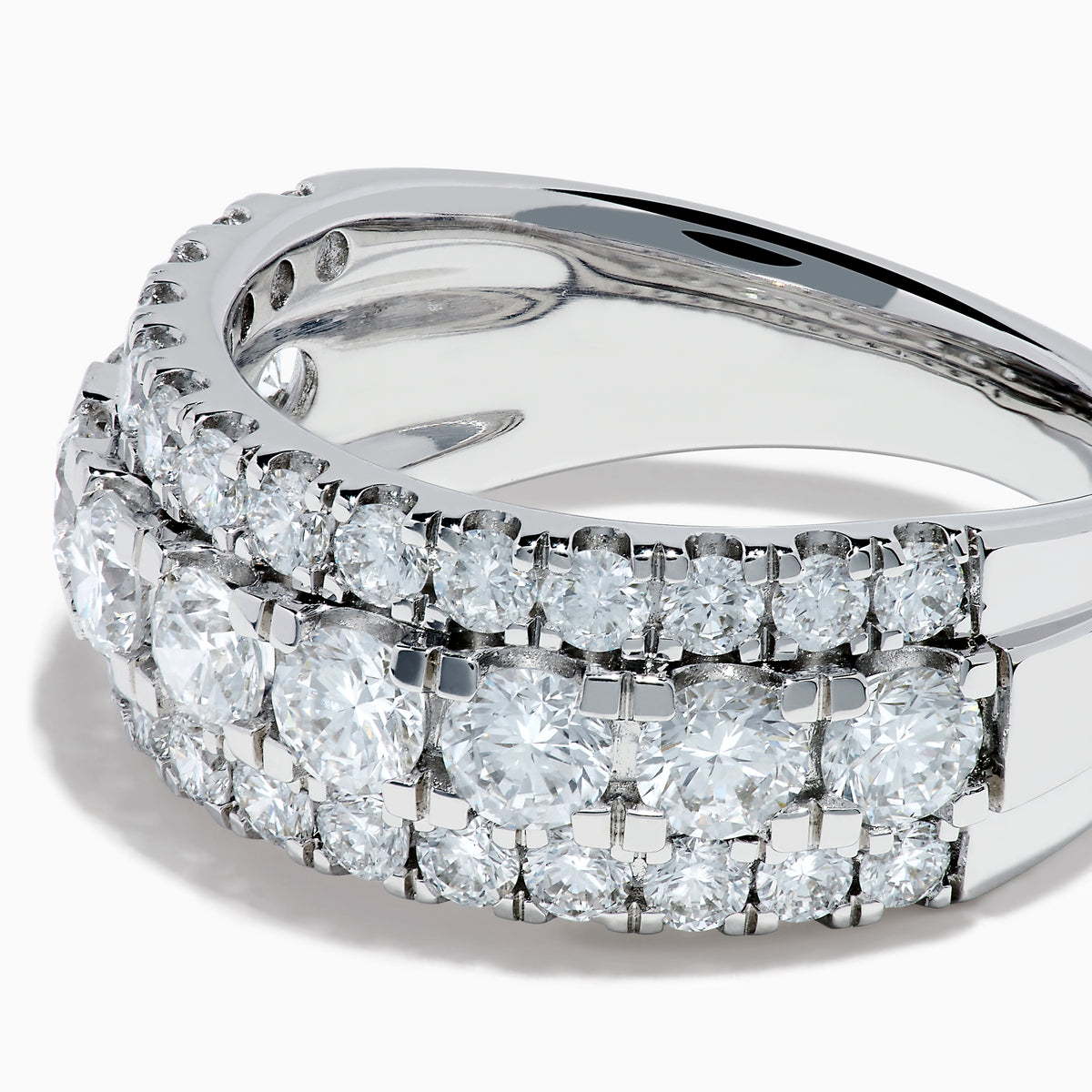 The Lab Grown Round Diamond Wide Band in 14K White Gold features three rows of round-cut diamonds, with a slightly larger center row, displayed on a plain white background.