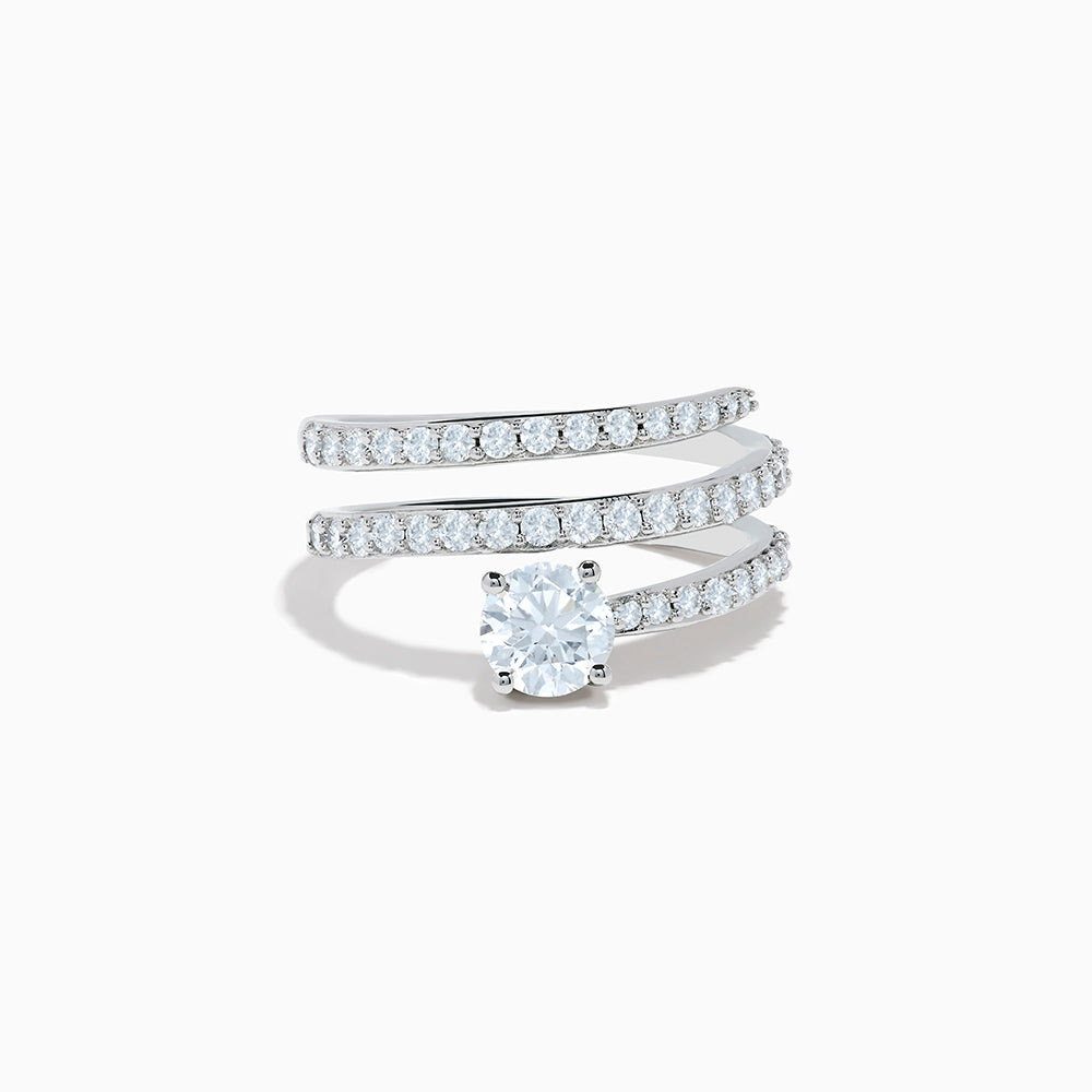 The Lab Grown Diamond Wrap Around Round Ring in 14K white gold showcases three curved, diamond-studded bands and a large round lab diamond at the center, set against a white background.