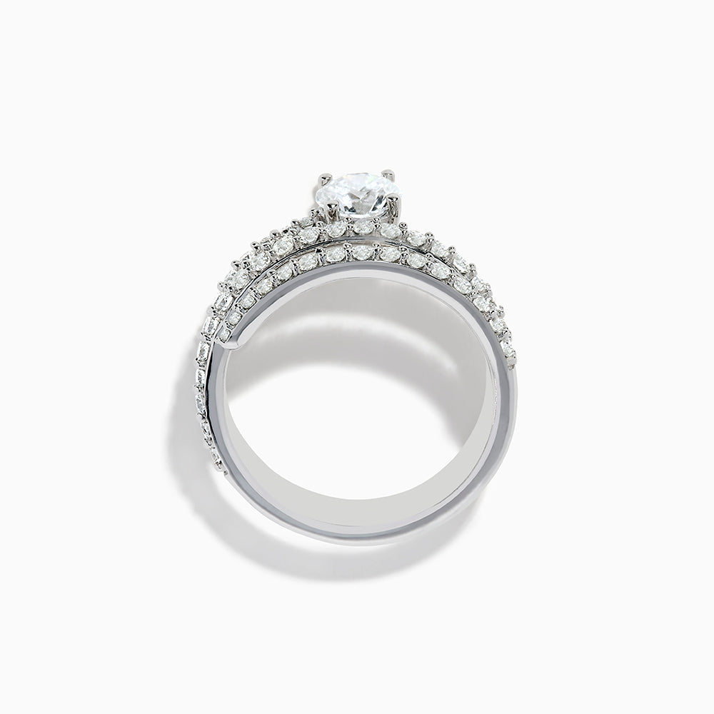 The Lab Grown Diamond Wrap Around Round Ring in 14K white gold showcases three curved, diamond-studded bands and a large round lab diamond at the center, set against a white background.