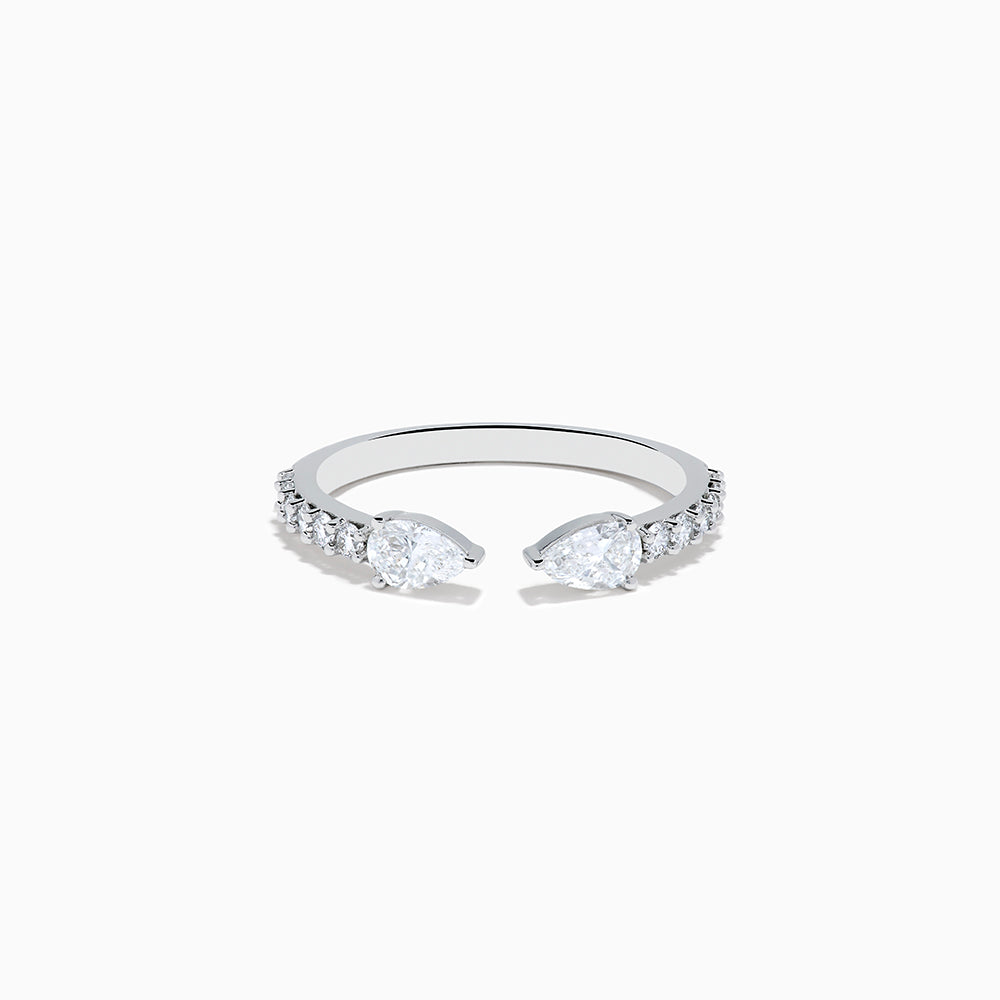 The Lab Grown Diamond Open Shank Pear Band in 14K white gold features two pear-shaped diamonds at each end and small round stones along the band.