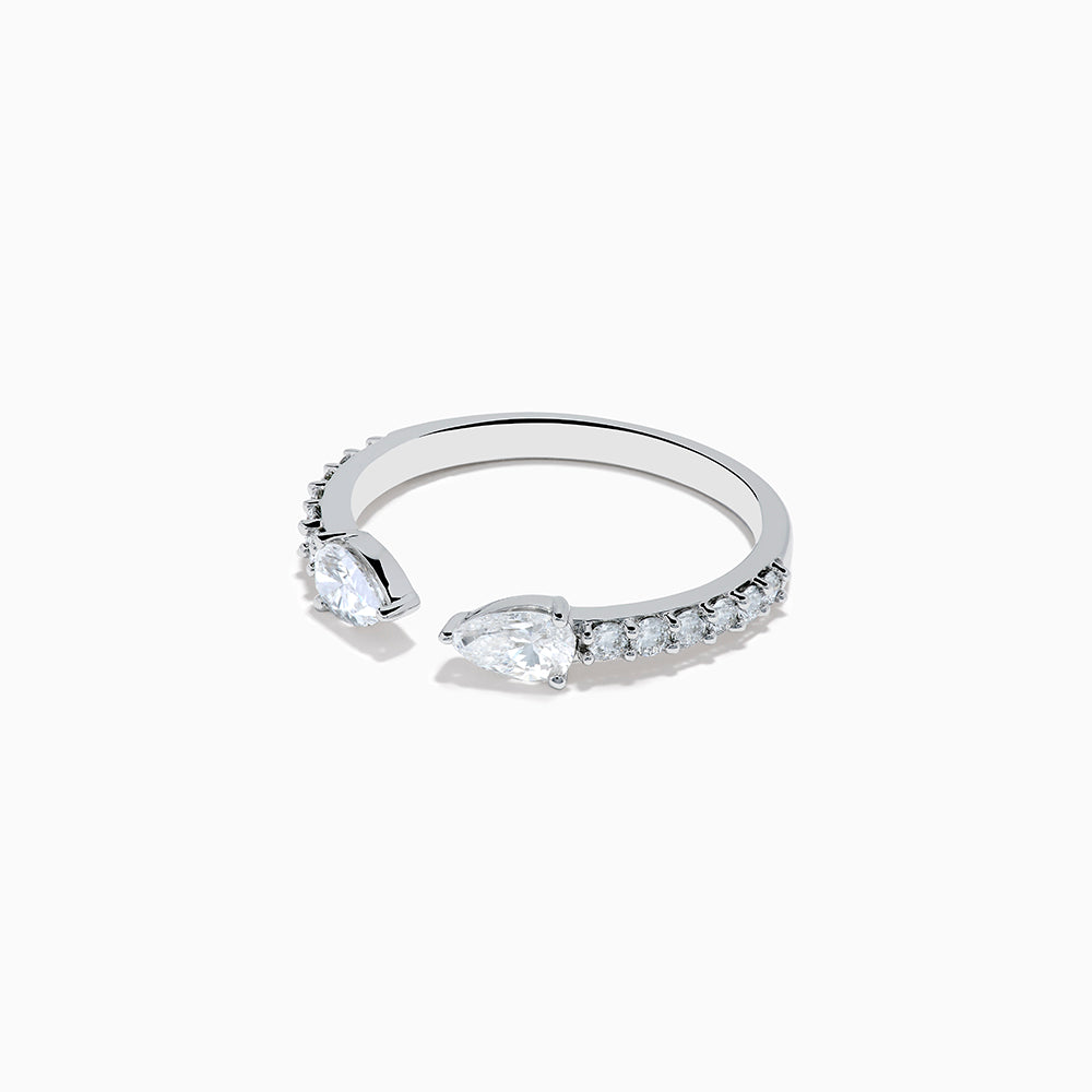 The Lab Grown Diamond Open Shank Pear Band in 14K white gold features two pear-shaped diamonds at each end and small round stones along the band.