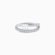 The Lab Grown Diamond Wrap around Pear Ring in 14K White Gold showcases a pear-shaped central diamond and a split shank adorned with lab diamonds, elegantly displayed on a plain white background.