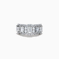 The Lab Grown Emerald Cut Diamond Halo Band in 14K White Gold showcases a luxurious row of large emerald-cut lab grown diamonds, accented by smaller round diamonds in an intricate halo design.