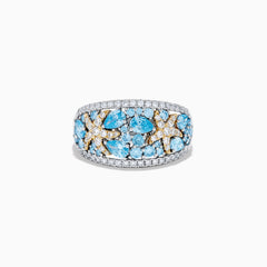 The Lab Grown Blue and White Diamond Starfish Ring in 14K Two Tone Gold features a wide silver band accented with clusters of light blue gemstones, two gold starfish, and sparkling lab grown diamonds, shown on a plain white background.