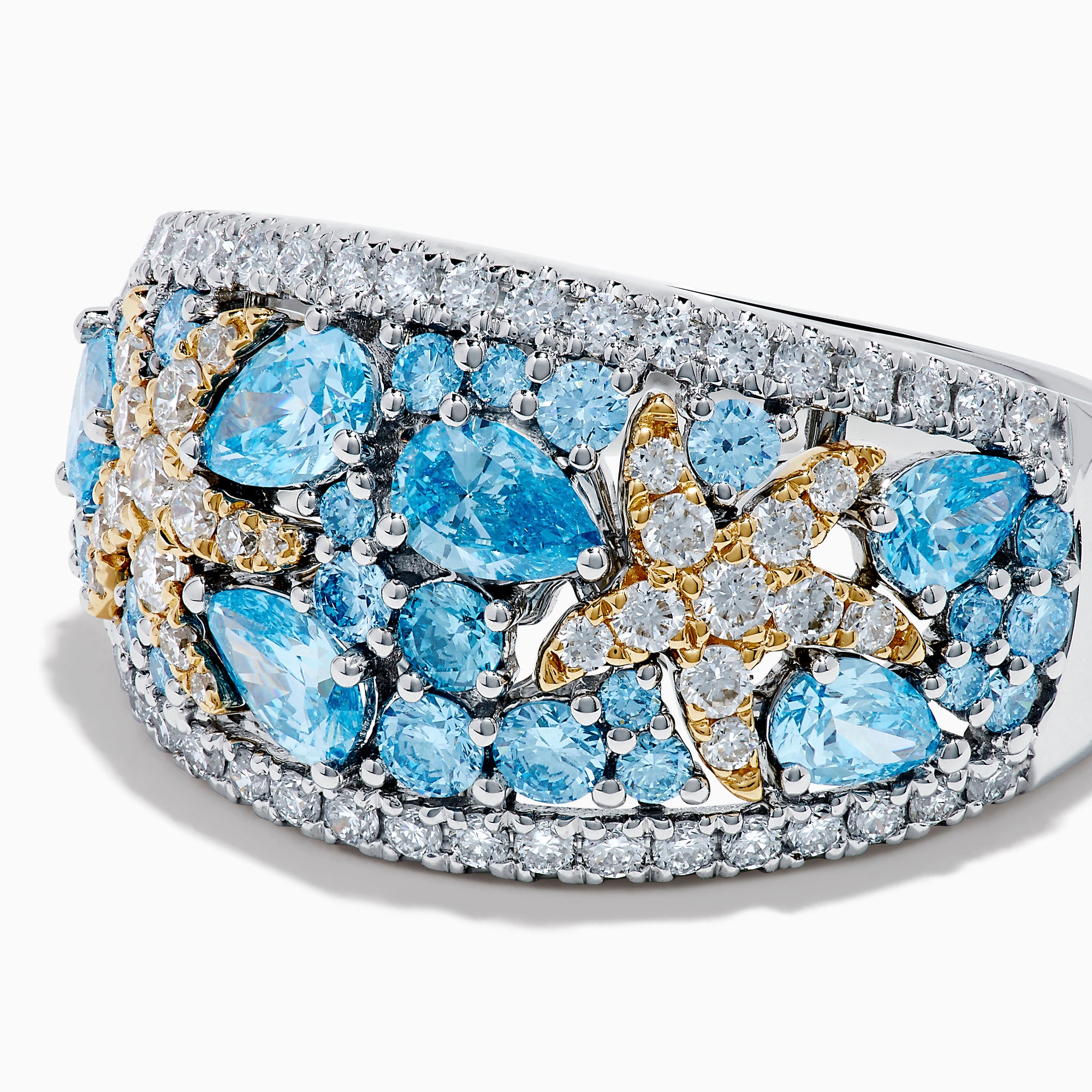 The Lab Grown Blue and White Diamond Starfish Ring in 14K Two Tone Gold features a wide silver band accented with clusters of light blue gemstones, two gold starfish, and sparkling lab grown diamonds, shown on a plain white background.