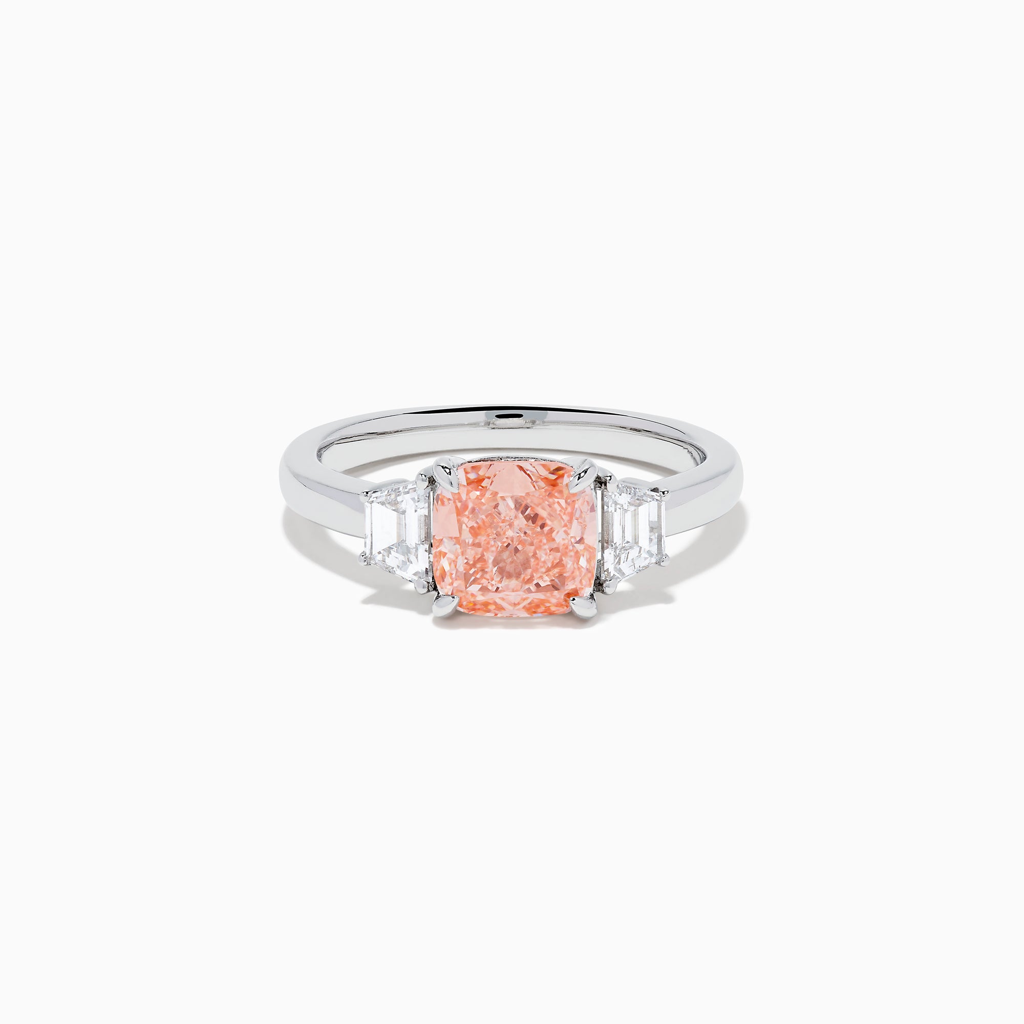 The Lab Grown Pink and White Diamond 3 Stone Ring in 14K White Gold features a rectangular cushion-cut pink center stone with two smaller rectangular white diamonds on each side.