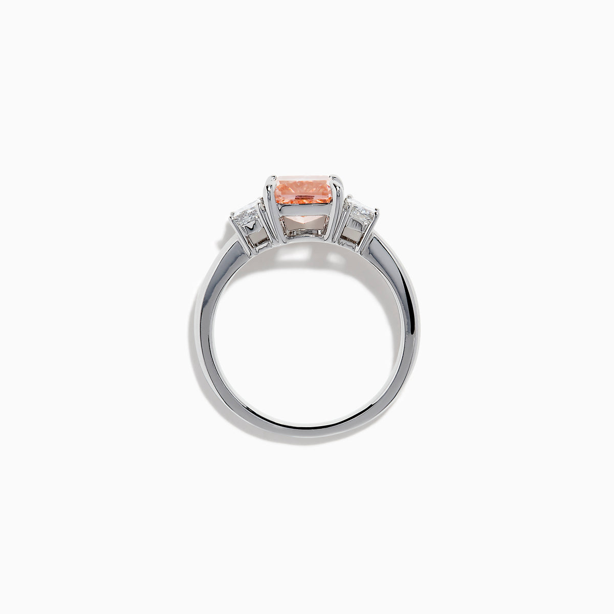 The Lab Grown Pink and White Diamond 3 Stone Ring in 14K White Gold features a rectangular cushion-cut pink center stone with two smaller rectangular white diamonds on each side.