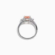 The Lab Grown Pink and White Diamond 3 Stone Ring in 14K White Gold features a rectangular cushion-cut pink center stone with two smaller rectangular white diamonds on each side.