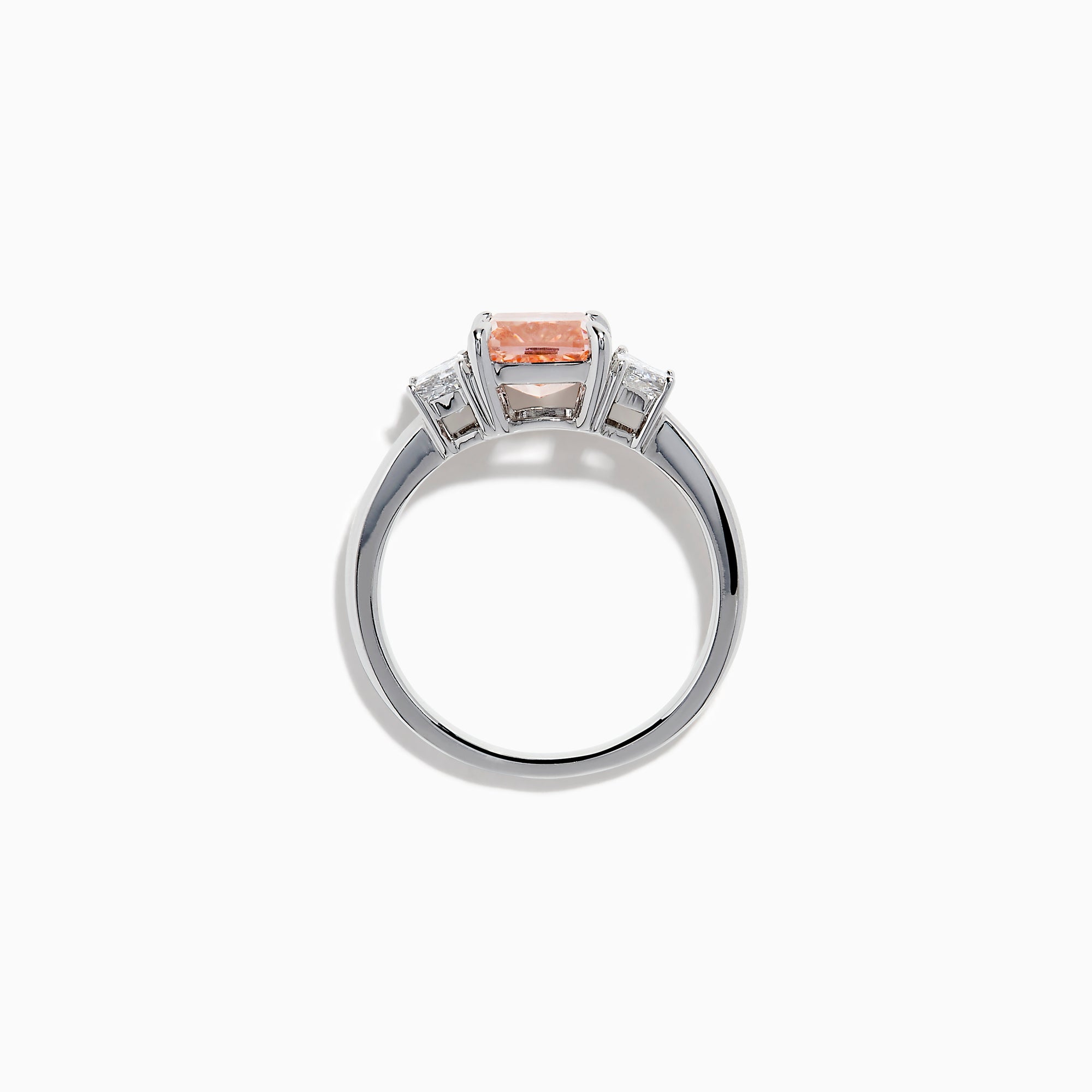 The Lab Grown Pink and White Diamond 3 Stone Ring in 14K White Gold features a rectangular cushion-cut pink center stone with two smaller rectangular white diamonds on each side.