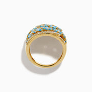 Make a statement with our Lab Grown Blue and White Diamond Statement Ring in 14K Yellow Gold, featuring marquise-cut blue stones and rows of lab-grown diamonds in an elegant wavy design.