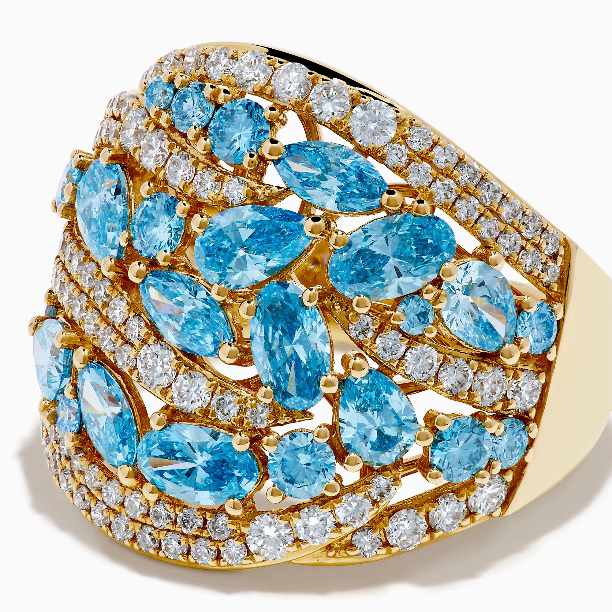Make a statement with our Lab Grown Blue and White Diamond Statement Ring in 14K Yellow Gold, featuring marquise-cut blue stones and rows of lab-grown diamonds in an elegant wavy design.