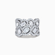The Lab Grown Multi Shape Diamond Wide Ring in 14K White Gold displays marquise, baguette, and round-cut lab grown diamonds set in an elaborate, interwoven silver design for a sparkling, textured look.