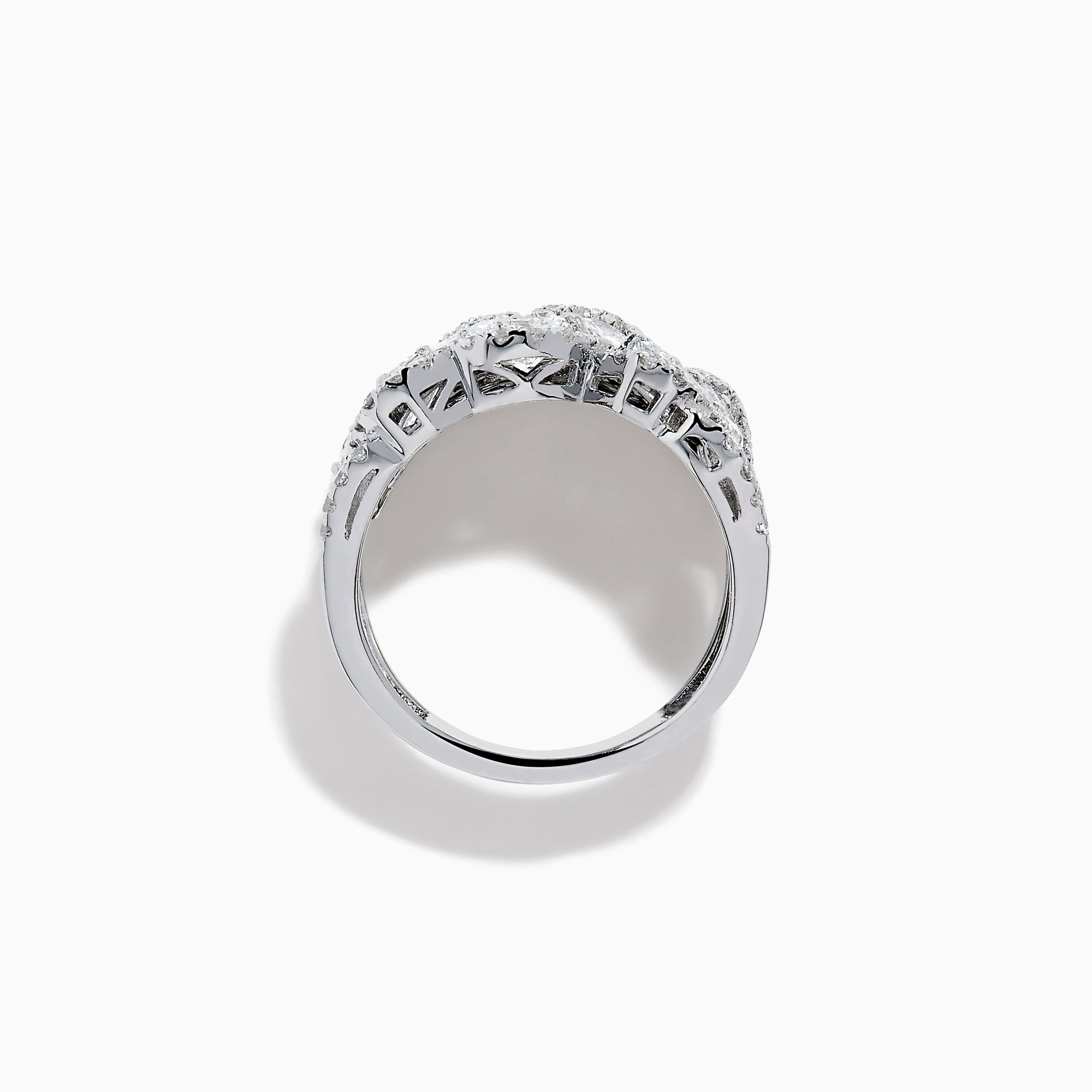 The Lab Grown Multi Shape Diamond Wide Ring in 14K White Gold displays marquise, baguette, and round-cut lab grown diamonds set in an elaborate, interwoven silver design for a sparkling, textured look.