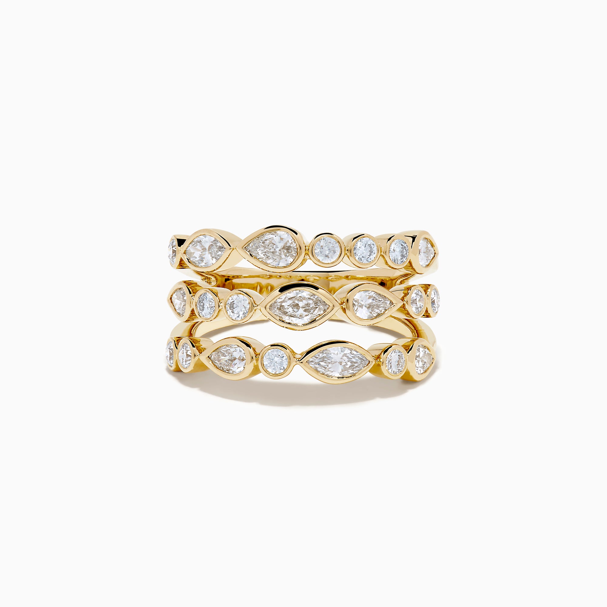 The Lab Grown Multi Shape Diamond Triple Row Bezel Ring in 14K Yellow Gold features three stacked bands with round and marquise lab grown diamonds set in bezel settings, creating a repeating diamond pattern around each row.