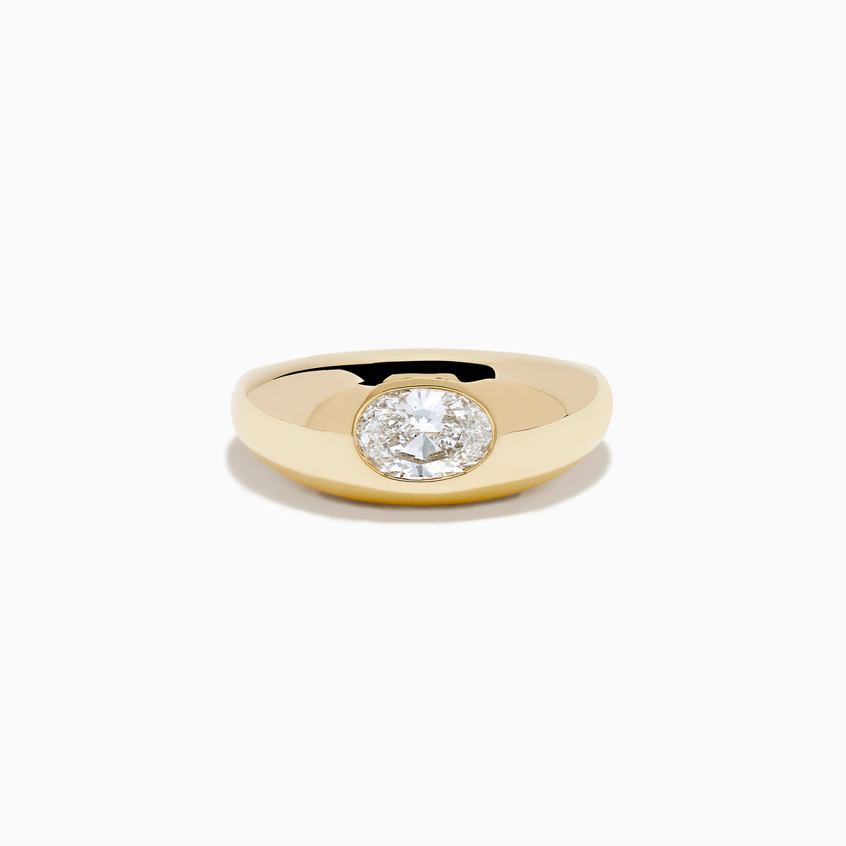 The Lab Grown Diamond Oval Bezel Pinky Ring in 14K Yellow Gold features a wide band and a prominent lab grown oval diamond set in the center.