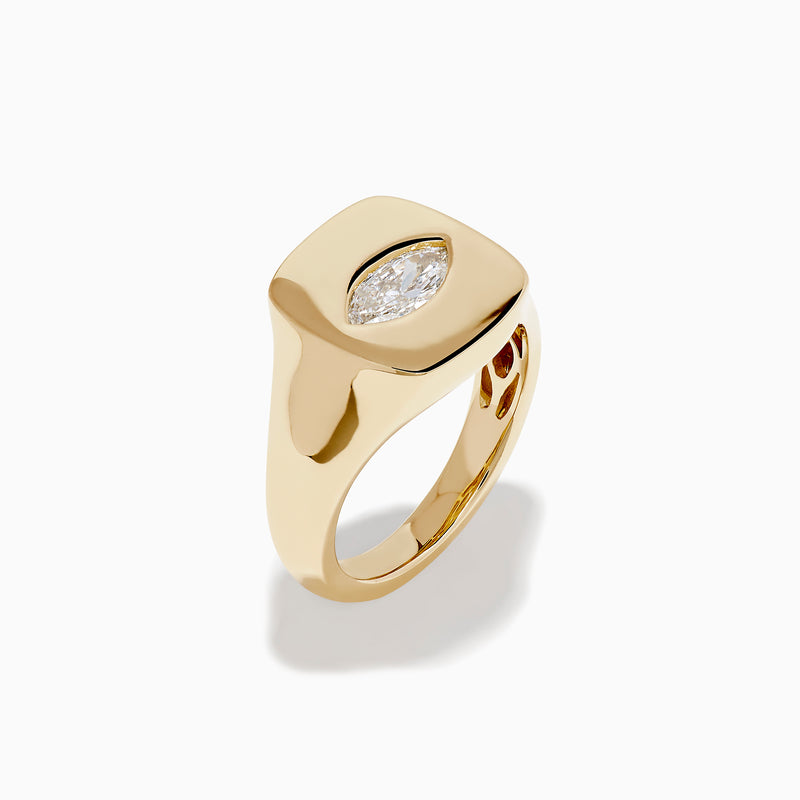The Lab Grown Diamond Marquise Inset Signet Pinky Ring in 14K Yellow Gold features a flat, rectangular top with a central lab grown diamond, shown against a plain white background.