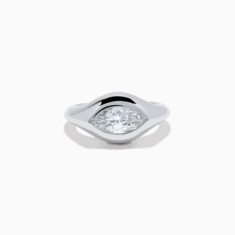 The Lab Grown Diamond Marquise Bezel Pinky Ring in 14K White Gold showcases a large marquise-shaped lab grown diamond set on a smooth, curved band, photographed against a white background.