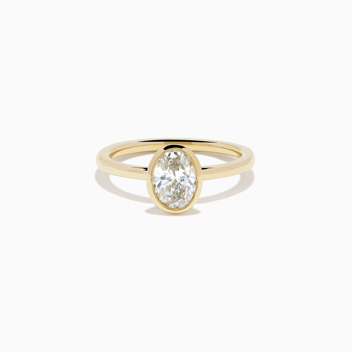 Lab Grown Diamond Oval Bezel-Set Solitaire Ring in 14K Yellow Gold