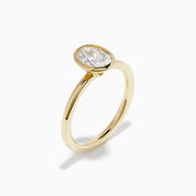 Lab Grown Diamond Oval Bezel-Set Solitaire Ring in 14K Yellow Gold
