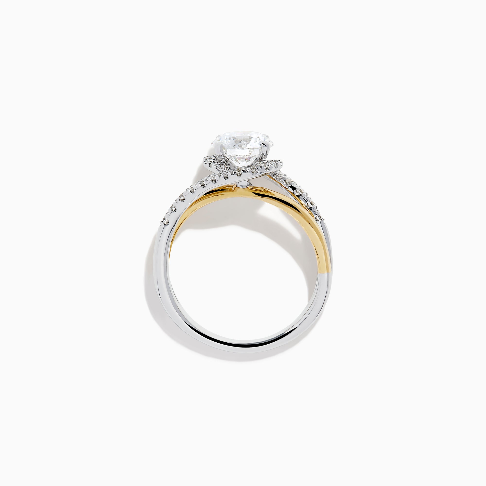 The Lab Grown Diamond Swirl Halo Ring in 14K Two-Tone Gold features a large round lab grown diamond center, surrounded by smaller diamonds in a spiral halo and set on dual gold and silver bands against a crisp white background.