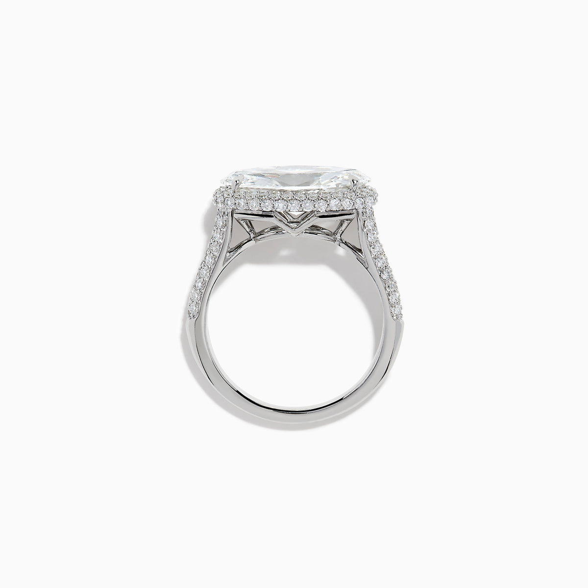 The Lab Grown Diamond East-West Oval Halo Ring in 14K White Gold showcases a brilliant lab-grown diamond center, accented by sparkling stones along the band, beautifully set against a plain white background.