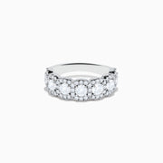 The 14K White Gold Diamond Ring showcases a row of large round diamonds, each encircled by smaller diamonds, forming a sparkling floral design across the band—a stunning example of diamond ring artistry.