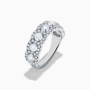 The 14K White Gold Diamond Ring showcases a row of large round diamonds, each encircled by smaller diamonds, forming a sparkling floral design across the band—a stunning example of diamond ring artistry.