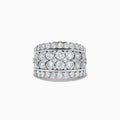 The Pave Classica 14K White Gold Diamond Statement Ring 4.84 TCW showcases three rows of round-cut diamonds, with a center row of larger stones framed by two rows of smaller diamonds—a dazzling statement piece.