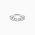 The 14K White Gold Contoured Diamond Stacking Band 0.95 TCW features a chevron shape with round diamonds along the front, showcased against a plain white background to emphasize its shine and elegance.