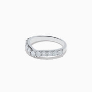 The 14K White Gold Contoured Diamond Stacking Band 0.95 TCW features a chevron shape with round diamonds along the front, showcased against a plain white background to emphasize its shine and elegance.