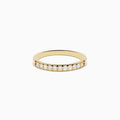 The DOro 14K Yellow Gold Diamond Band 0.24 TCW showcases a row of small, round white diamonds set into the gold band, displayed on a plain white background.