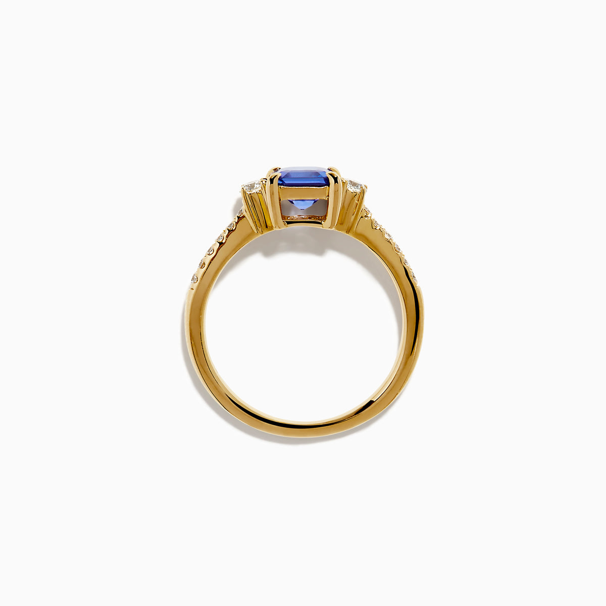 The 14K Yellow Gold Tanzanite and Diamond Ring showcases a square-cut blue tanzanite centerpiece, accented by round white diamonds set along the band.