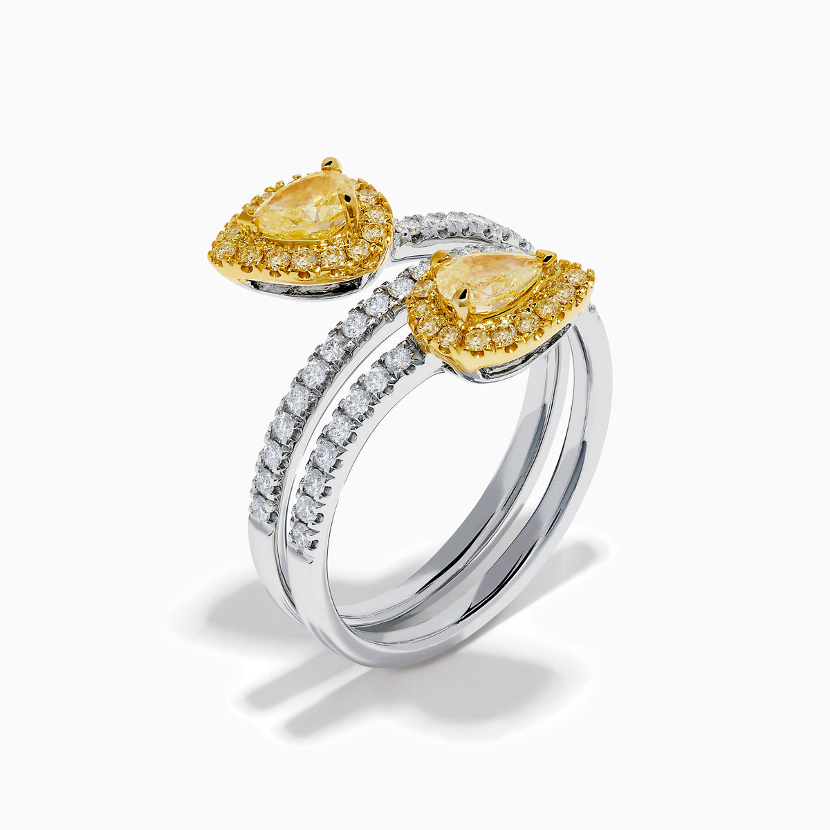 The 18K Two-Tone Gold Yellow and White Diamond Wrap Bypass Ring features pear-shaped diamond clusters haloed by smaller diamonds on a split gold band sparkling with round white diamonds.