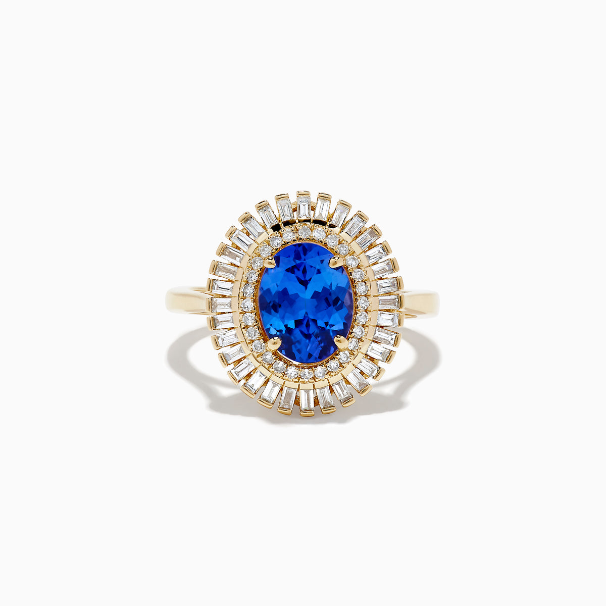 The Nahla Siri 14K Yellow Gold Tanzanite and Diamond Ring features an oval-cut tanzanite center with two halos of baguette and round diamonds, beautifully presented on a plain white background.