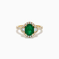 The Brasilica 14K Yellow Gold Emerald and Diamond 3 Stone Ring features an oval green emerald and sparkling diamonds on a diamond-studded band—an elegant choice for any occasion.