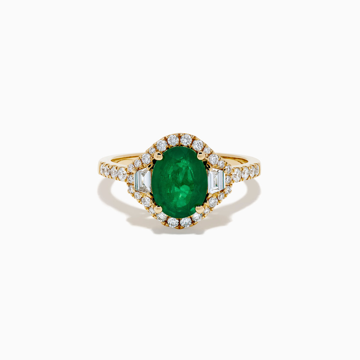 The Brasilica 14K Yellow Gold Emerald and Diamond 3 Stone Ring features an oval green emerald and sparkling diamonds on a diamond-studded band—an elegant choice for any occasion.