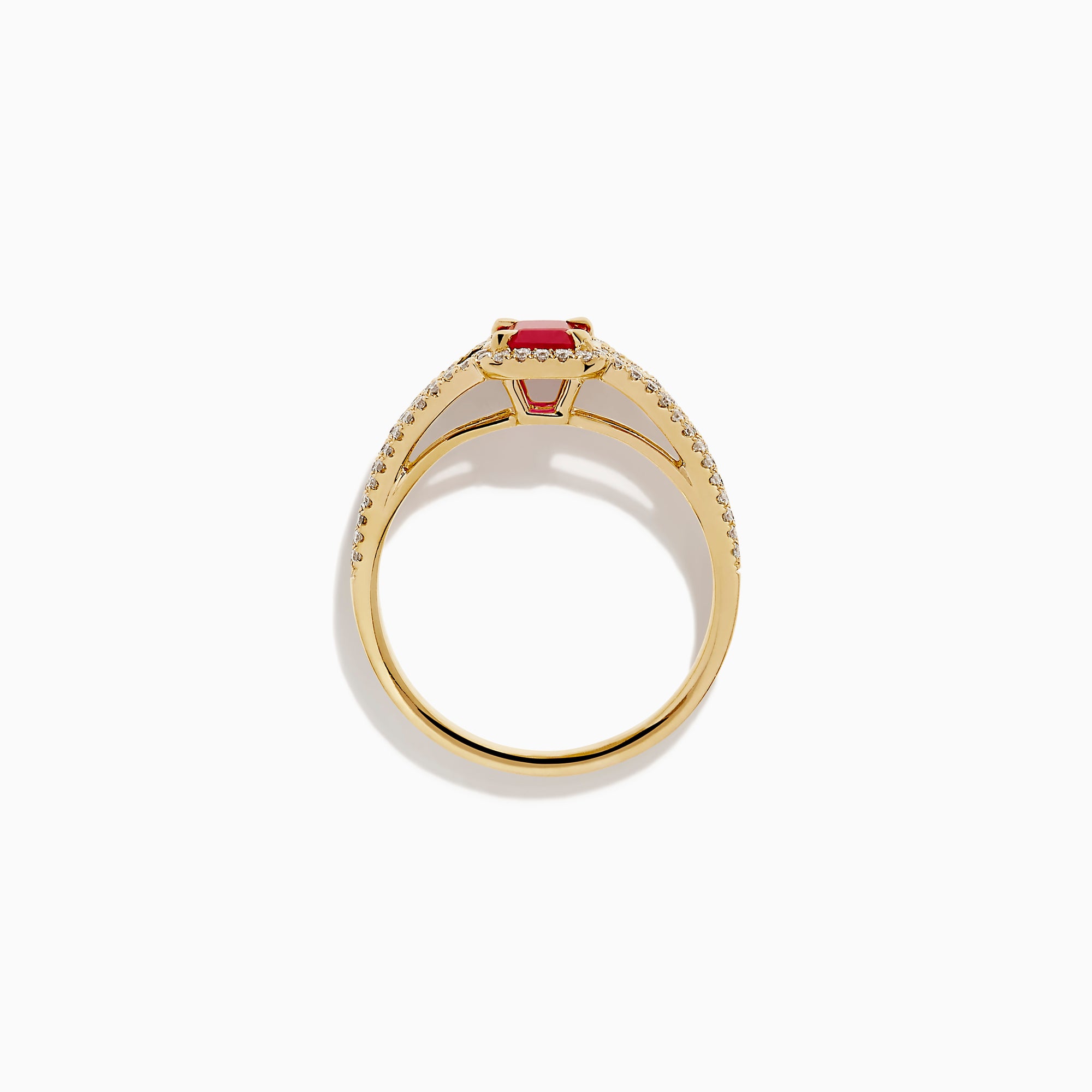 The 14K Yellow Gold Emerald Cut Ruby and Pave Diamond Halo Ring features a central emerald-cut ruby, diamond accents, and a shimmering halo for added brilliance.