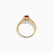 The 14K Yellow Gold Oval Ruby and Diamond Halo Ring features a central oval ruby surrounded by a sparkling diamond halo, with additional diamonds adorning the elegant band.