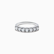 The 925 Silver Diamond Band Ring features a row of oval-cut white gemstones set along the top, shown on a plain white background.