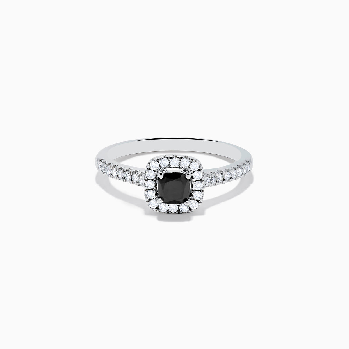 The 14K White Gold White and Black Diamond Halo Ring features a rectangular black center stone surrounded by white diamonds, with more diamonds along the band, all presented on a white background.