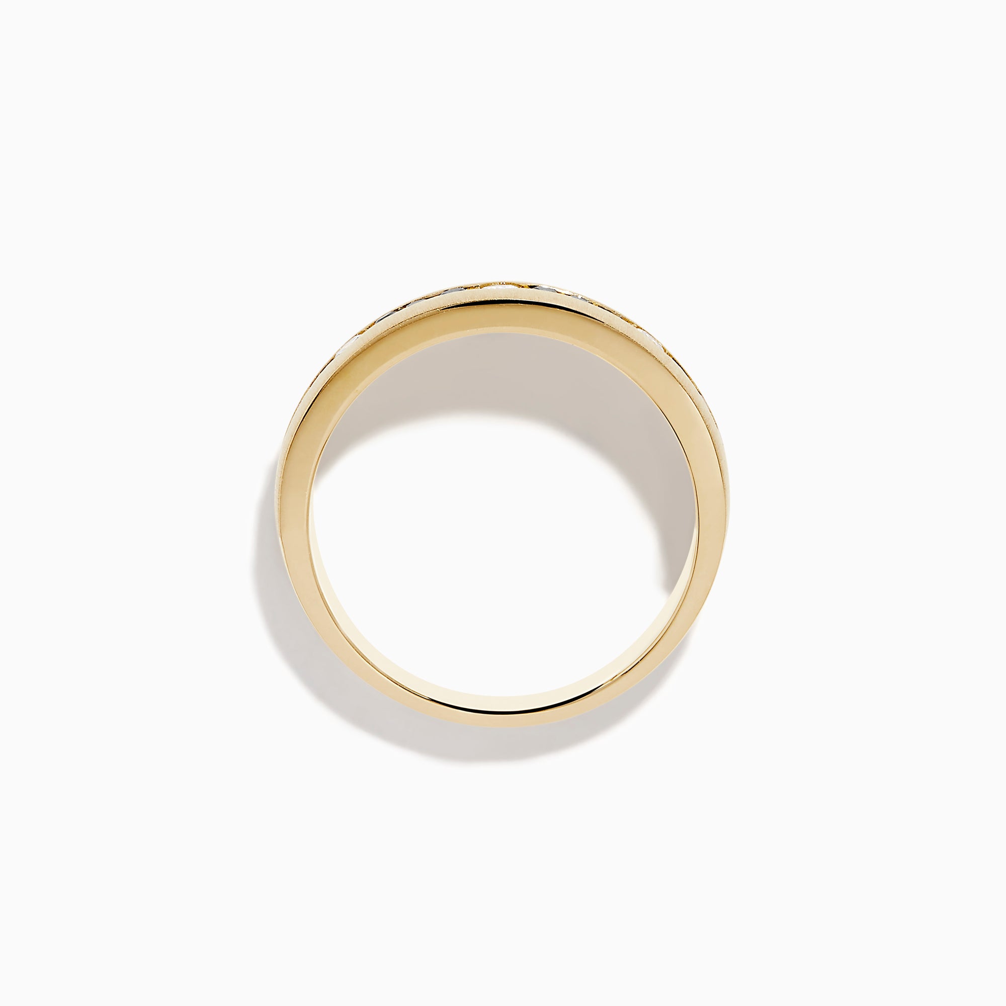 The Mens 14K Yellow Gold White and Black Diamond Band Ring features alternating black and white round diamonds set in the center, showcased against a plain white background.