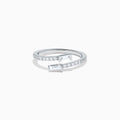 The 14K White Gold Diamond Bypass Ring features two rectangular baguette-cut diamonds at each end and a row of small round diamonds along the band, beautifully set against a white background.