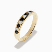 The Caviar 14K Yellow Gold Black and White Diamond Band Ring features alternating black and white diamonds in a channel setting, shown against a plain white background.
