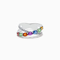 The Watercolors 14K White Gold Multi Sapphire and Diamond Crossover Ring features a crisscross design with vivid multicolored sapphires and a band set with sparkling diamonds, all showcased against a plain white background.
