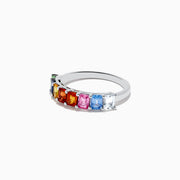 The Watercolors 14K White Gold Multi Sapphire Ring showcases a row of rectangular gemstones in green, blue, yellow, orange, red, pink, and clear hues set side by side across the band.