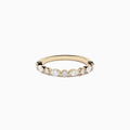 The Doro 14K Yellow Gold Diamond Ring by Effy features a series of oval and round diamonds set along the band, beautifully displayed against a plain white background.