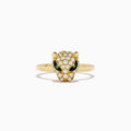 The Signature 18K Yellow Gold Diamond and Tsavorite Panther Ring features a leopard head adorned with white diamonds and two green tsavorite eyes, shown against a plain white background.